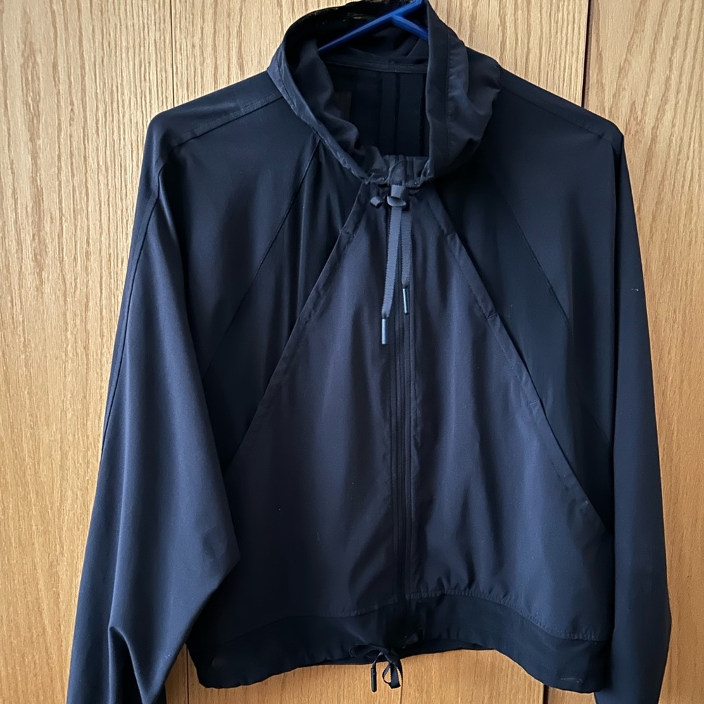 Lululemon black jacket for summer, super cute, transparent/mesh details. Size 4
